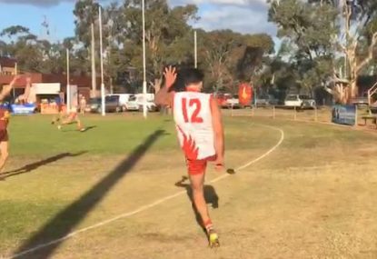 Drop punt gets ridiculous bend to split the goal posts