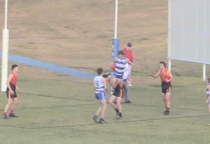 Schoolboy footy star's sensational high-flying grab is majestic
